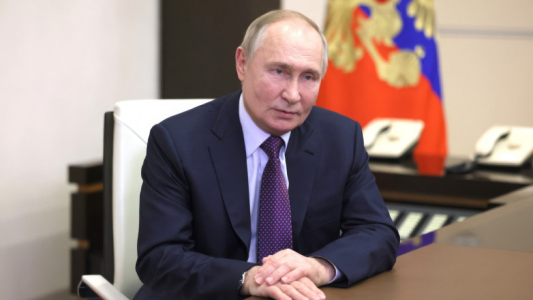 Vladimir Putin acordă cetățenia rusă lui John Robles, primul refugiat politic american